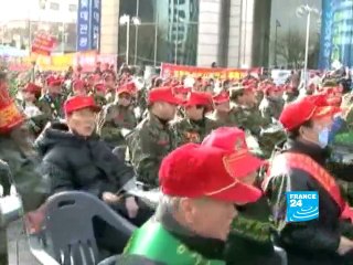 South Koreans pressuring their government to use force