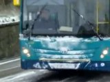 Bus driver shows motorists how to climb icy hill