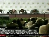 Delegaciones protestan contra resultados de cumbre en Cancún