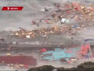 Australia continues hunt for refugee boat victims