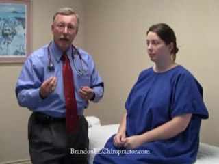 Brandon Chiropractor Evaluating Brain Function Hand Movement