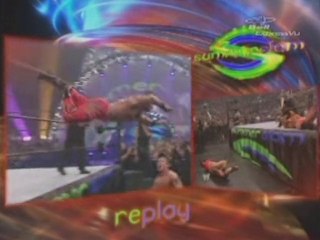 Benoit hits the barricade while making a suicide dive