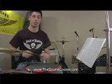 dog playing drums online lessons