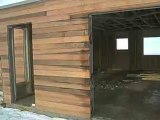 vidéo de la construction maison en bois bardage Red cedar