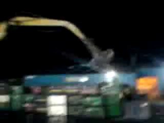 0066 - Tour de manège accroché à une grue