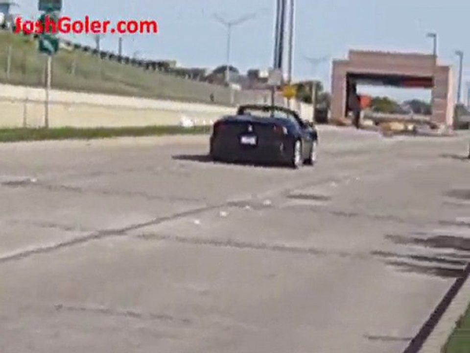 Black Ferrari California - Accelerates into Street