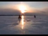 soleil couchant en quad sur le lac St Pierre