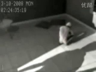 captured alien in cell