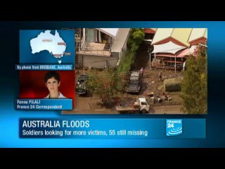 Australia: 'Heartache' as Brisbane residents dig out