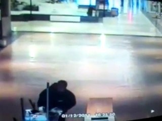 Girl falls into fountain while texting at shopping mall