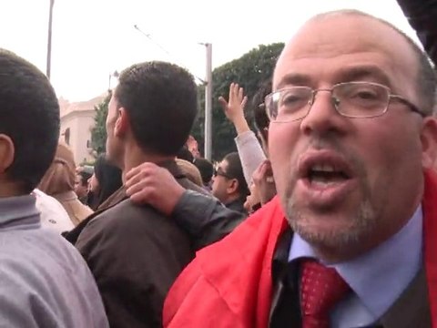 Thousands rally as Tunisia probes regime assets