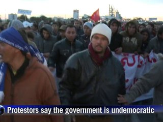 Protest march calls on Tunisian PM to quit