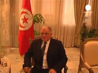 Ghannouchi hangs on in Tunisian reshuffle