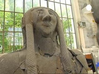 Bomb-damaged statues pieced back together