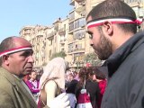 Egyptians brandish brooms in revolution's wake