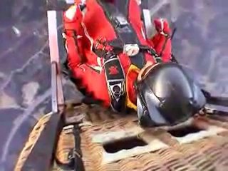 Wingsuit flying with rocketboots - CRAZY!