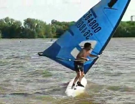 Freestyle windsurfing - jumping the boom