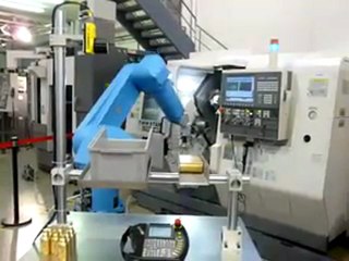 Okuma LT200MY carga automatica robot MachineTools.TV