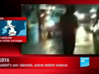 Gaddafi's son warns of civil war as protests widen