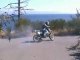 guy loses dirt bike over cliff
