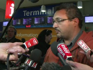French evacuees arrive home from Libya