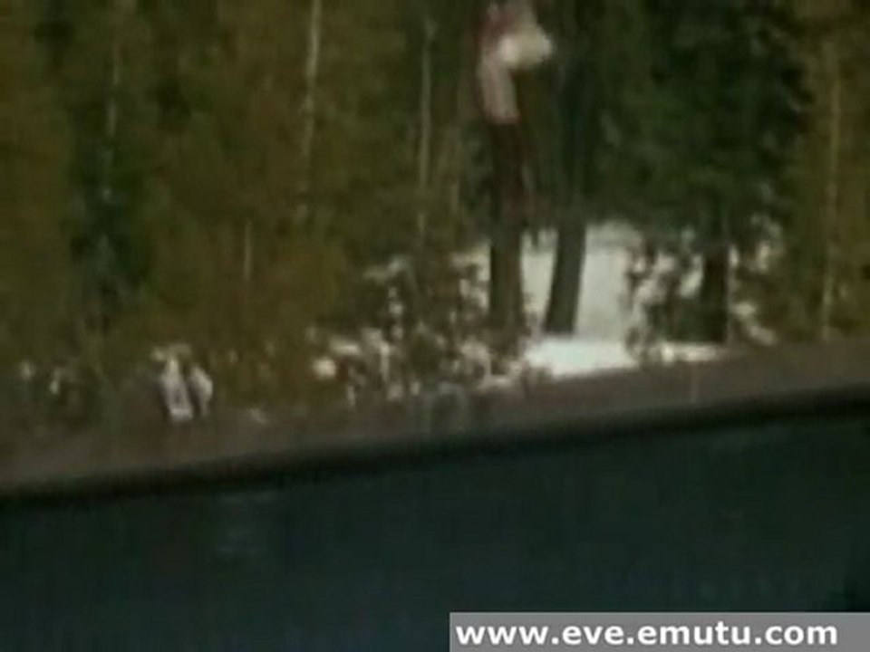 snowboard jump over train