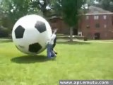 kicked by a big soccer ball
