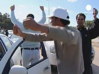 Pro-Gaddafi supporters rally in Tripoli