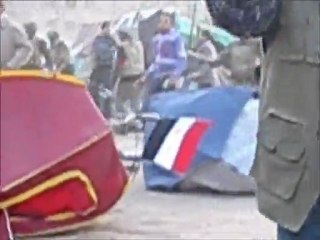 army and Civilians forcing protesters to leave Tahrer square