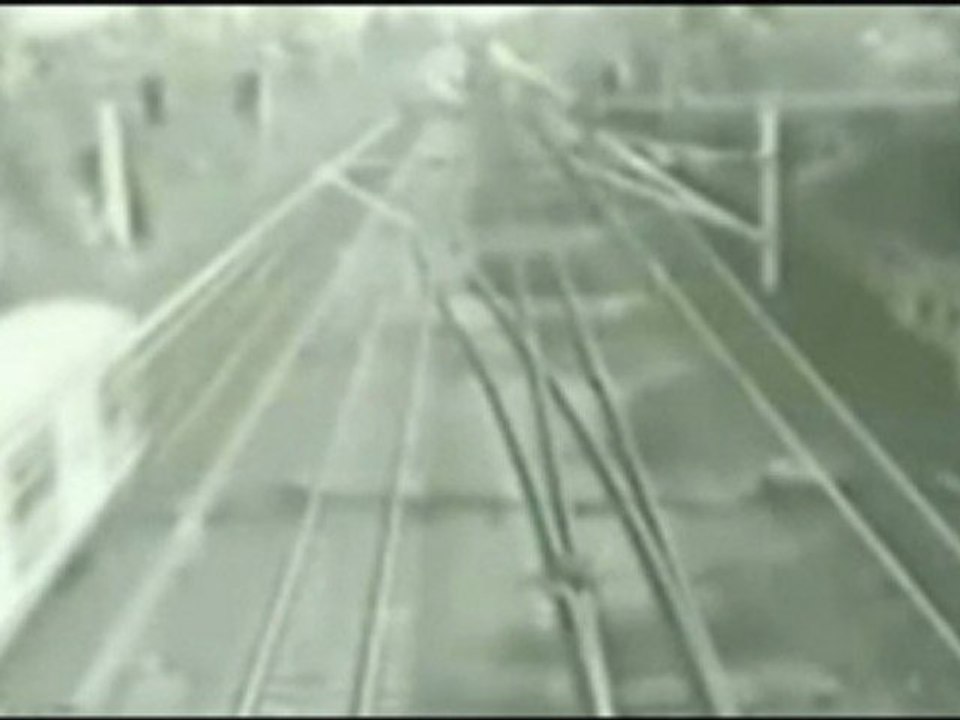 Guy gets hit by a train   amazing reflexes