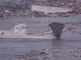 Tsunami hits northern Japanese town