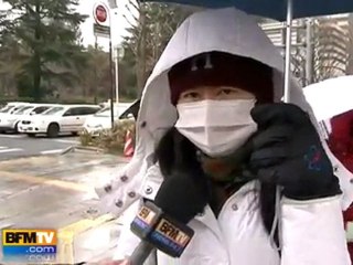 Japon : masques et parapluies pour se protéger