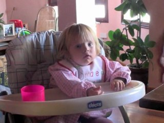 A girl eating potatoes