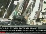 Televisión libia presenta armas entregadas por opositores