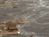 Caught on Tape_ Tsunami hits Japan port town