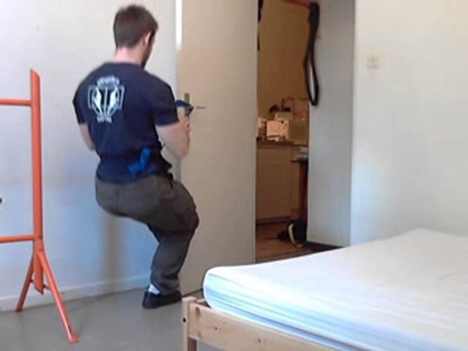squat 1J aidé.