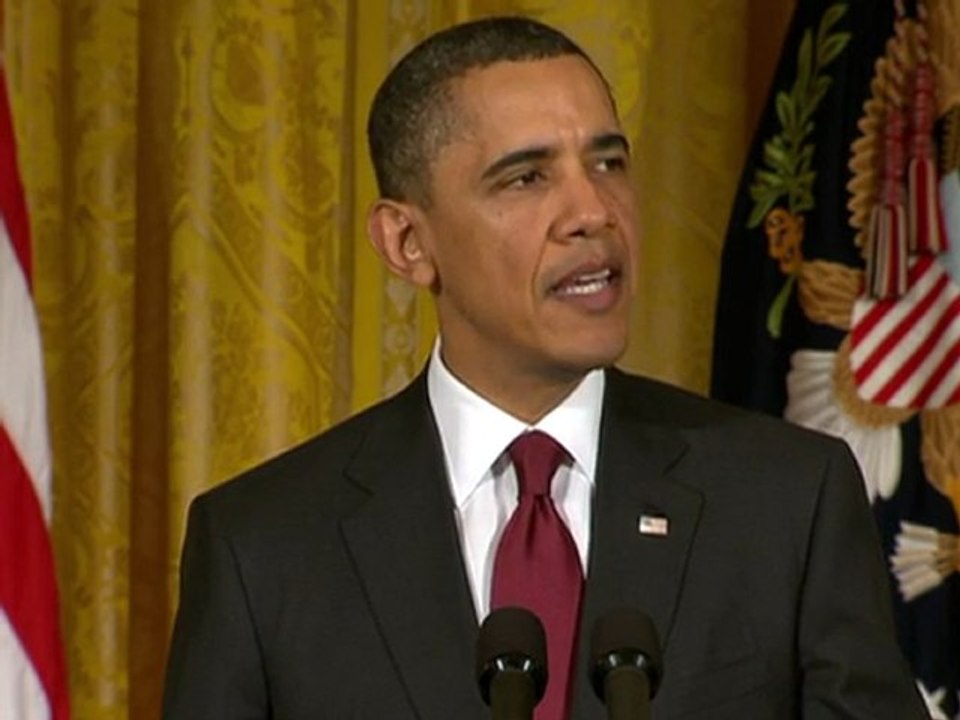 Obama warns of military action against Kadhafi