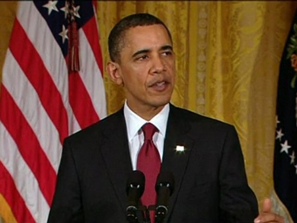 Obama warns Gaddafi