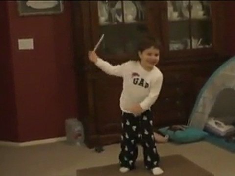 Child conducting Beethoven's 5th symphony