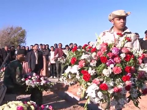 Kadhafi supporters pray for air strike victims