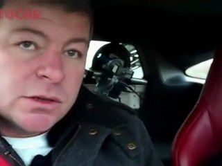 McLaren F1 takes on the MP4-12C on track