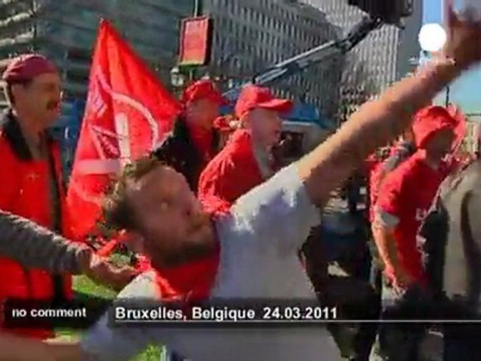 Thousands protest outside EU Brussels summit - no comment