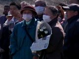 More Victims of Japan Disaster Buried in Mass Graves