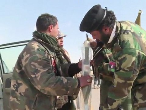 Libyan rebel forces fight to retake Ajdabiya