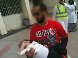 a child being rejected from the salmaniya hospital cuz his parents not protesting against gov