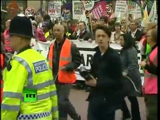 Video of thousands in London protest march as paint bombs, flares fly