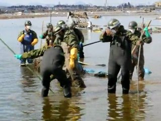 Japan Self-Defense Forces look for tsunami dead