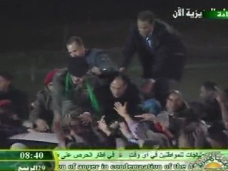 Libya shows images of Kadhafi son after death rumours