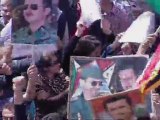 Thousands of Assad supporters rally in Damascus