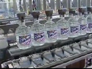 Case loading, shrink bundling, palletization for home care 1